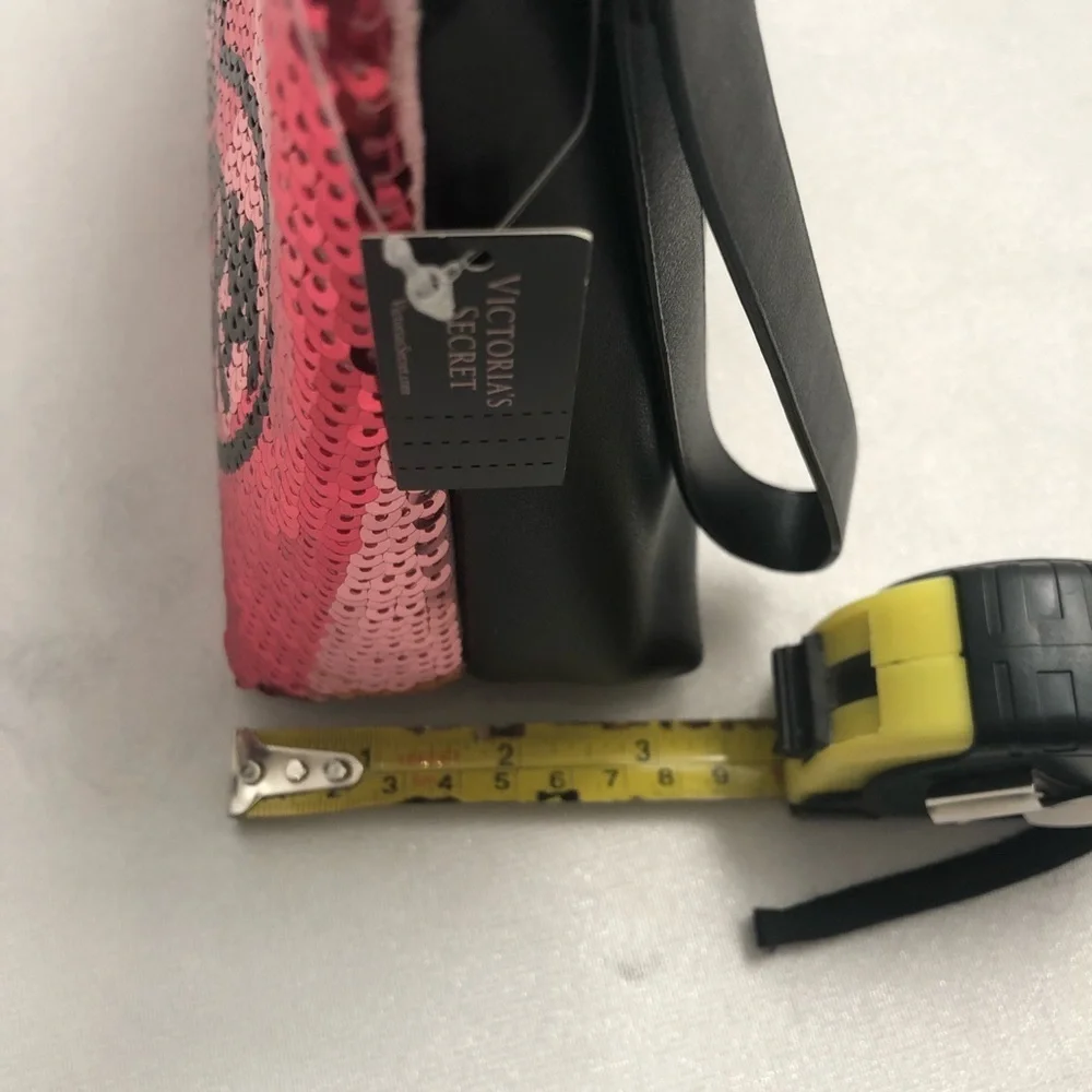 Victoria’s Secret pink and black sequin cosmetic or toiletries bag